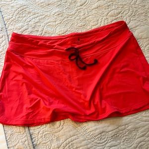 ATHLETA - new without tags . Beach bottom coverup . Orange color